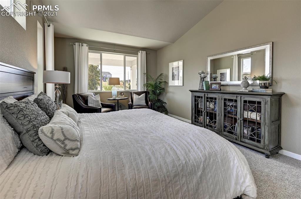 2903 Golden Meadow Way Colorado Springs, CO 80908 - Photo 20 of 49 a bed room with a bed and a large window