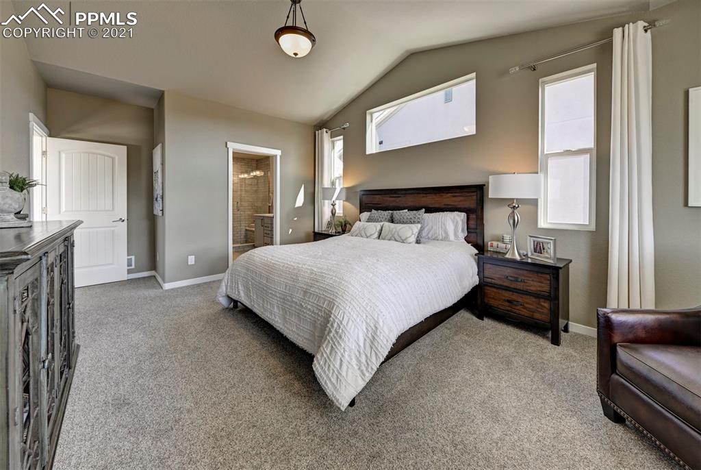 2903 Golden Meadow Way Colorado Springs, CO 80908 - Photo 21 of 49 a bedroom with a bed and a couch