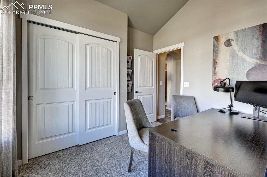 2903 Golden Meadow Way Colorado Springs, CO 80908 - Photo 45 of 49 a view of a livingroom with furniture and a window