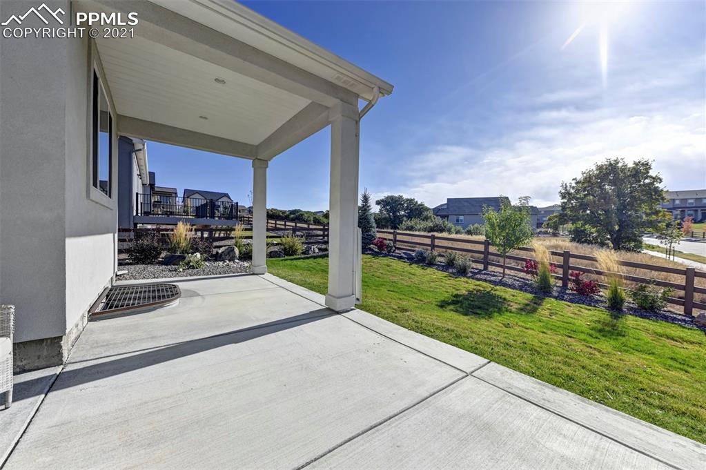 2903 Golden Meadow Way Colorado Springs, CO 80908 - Photo 49 of 49 a view of a backyard with sitting area