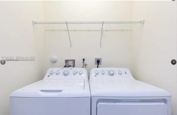 a utility room with dryer and washer