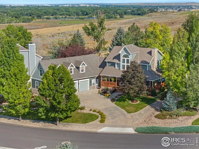 an aerial view of a house with lake view and mountain view