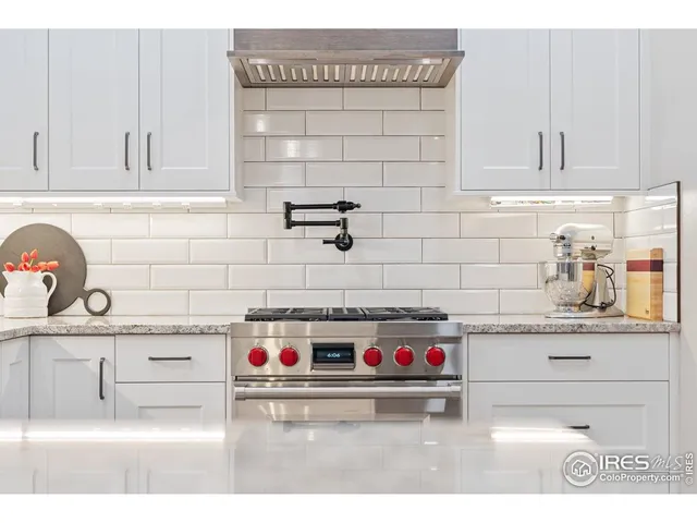 a utility room with cabinets