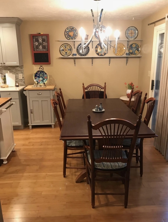 303 Lexington Street, Unit 303 Watertown, MA 02472 - Photo 9 of 13 a dining room with furniture and window