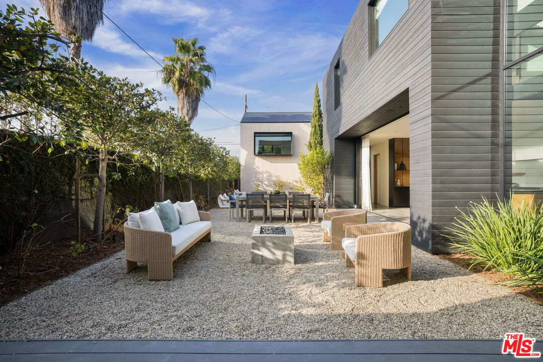 901 Flower Avenue Venice, CA 90291 - Photo 16 of 48 a view of a house with backyard and sitting area