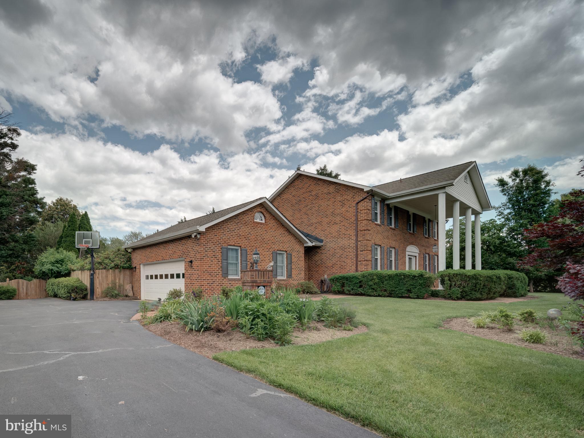 4387 Stepney Drive Gainesville, VA 20155 - Photo 2 of 74 a view of a yard in front of house
