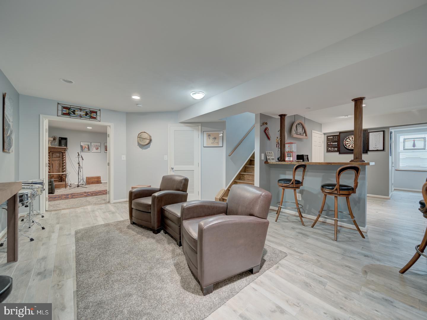 4387 Stepney Drive Gainesville, VA 20155 - Photo 56 of 74 a living room with furniture and wooden floor
