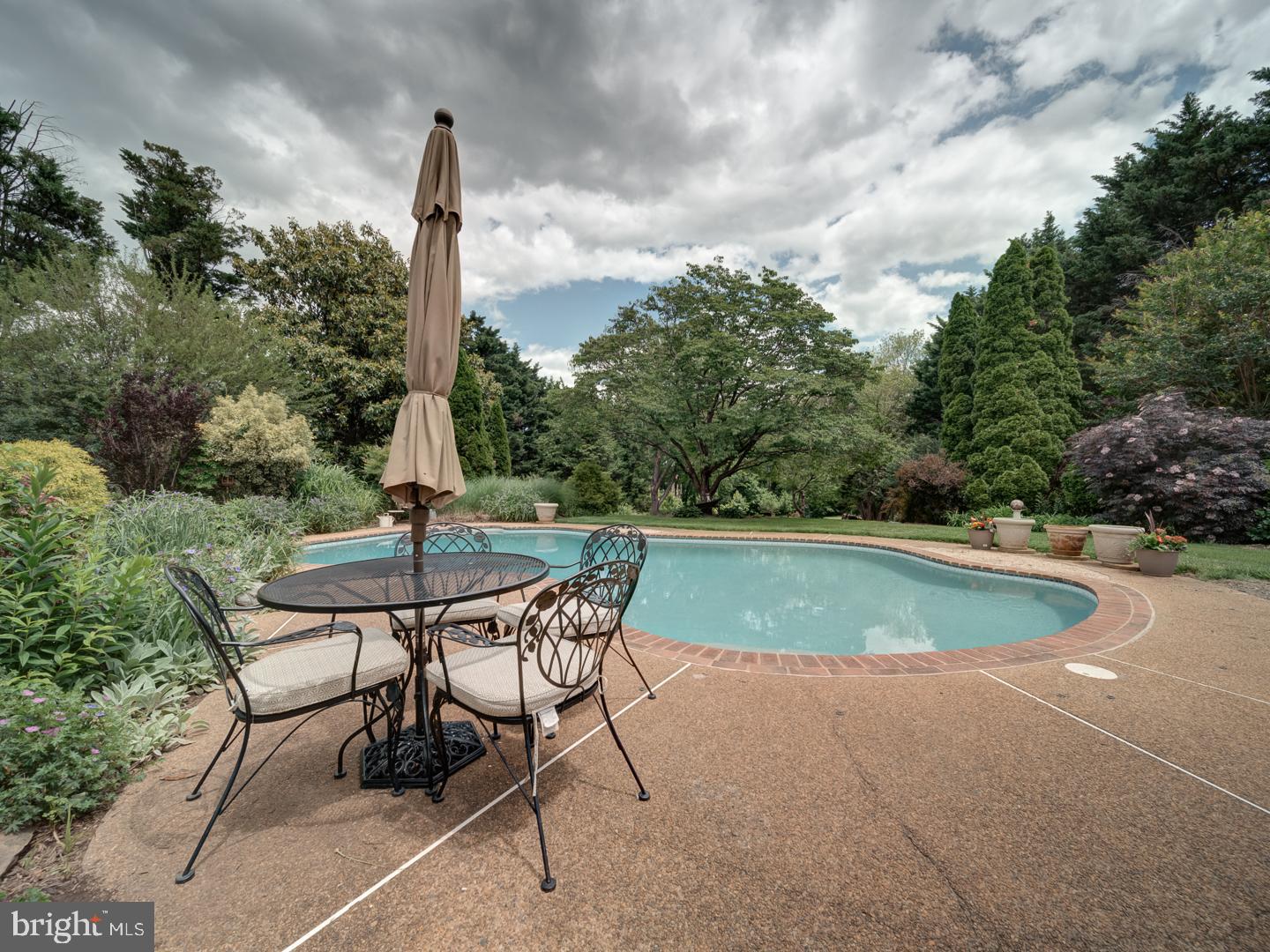 4387 Stepney Drive Gainesville, VA 20155 - Photo 61 of 74 a view of a backyard with sitting area