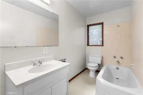 a bathroom with a sink and a bathtub