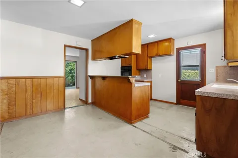 a view of a kitchen with a sink