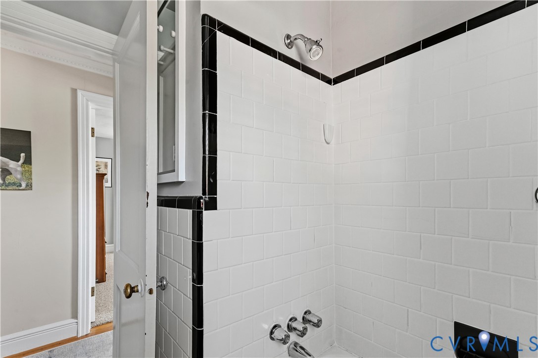 2107 Lennox Road Henrico, VA 23228 - Photo 29 of 47 Tub/shower combination featuring white subway tile