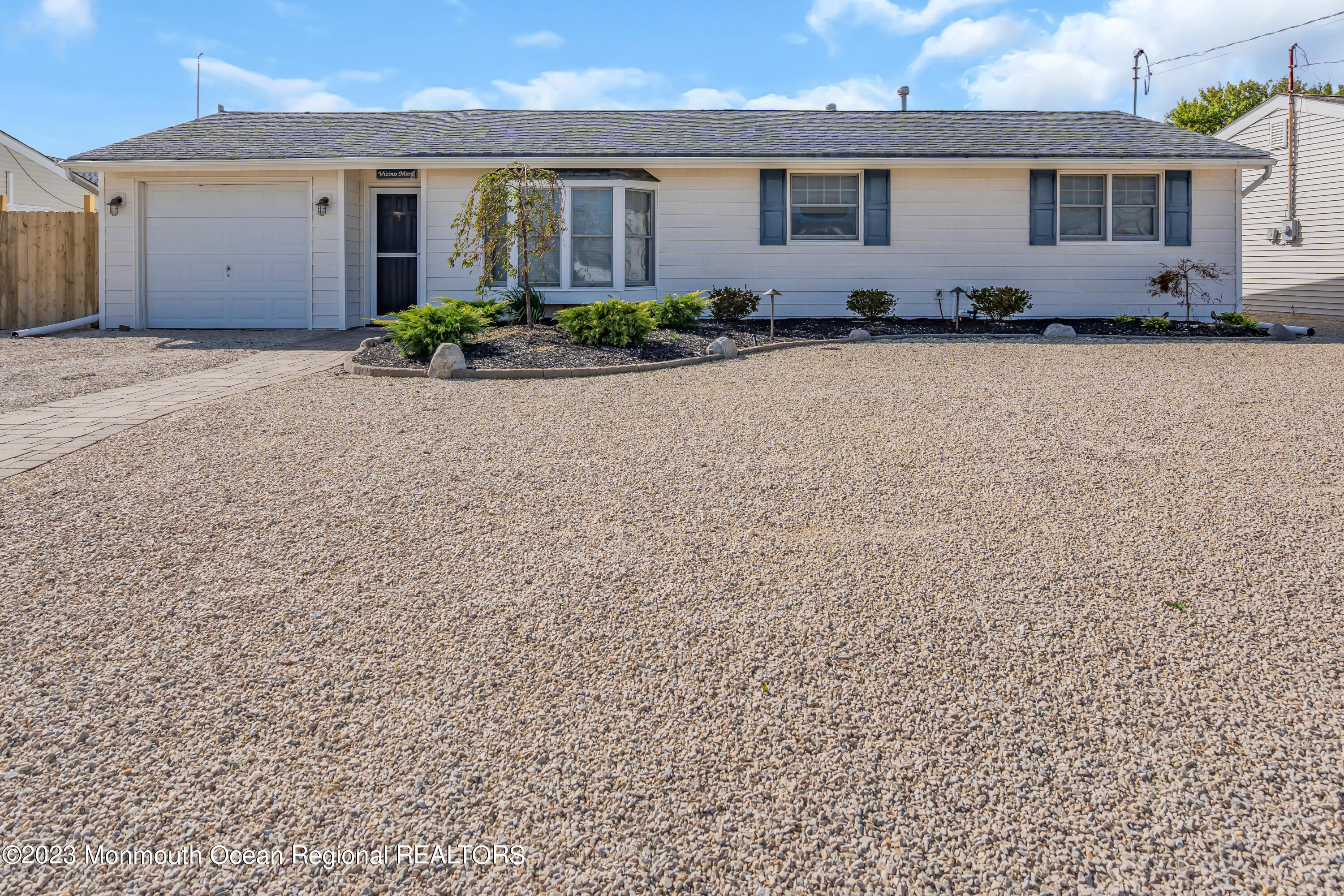 112 Newark Road Barnegat, NJ 08005 - Photo 1 of 44 a front view of a house with garden