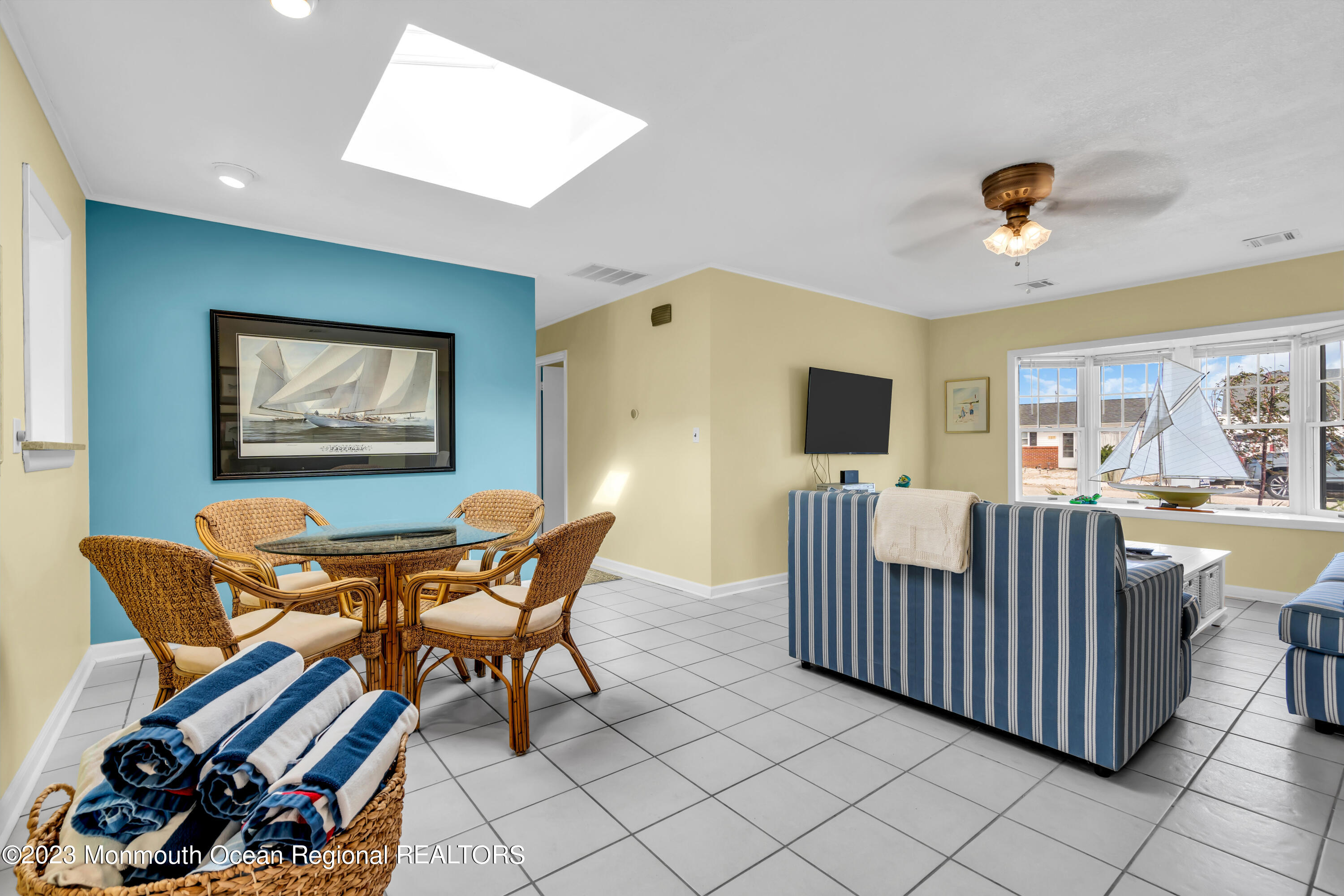 112 Newark Road Barnegat, NJ 08005 - Photo 11 of 44 a living room with furniture and a flat screen tv