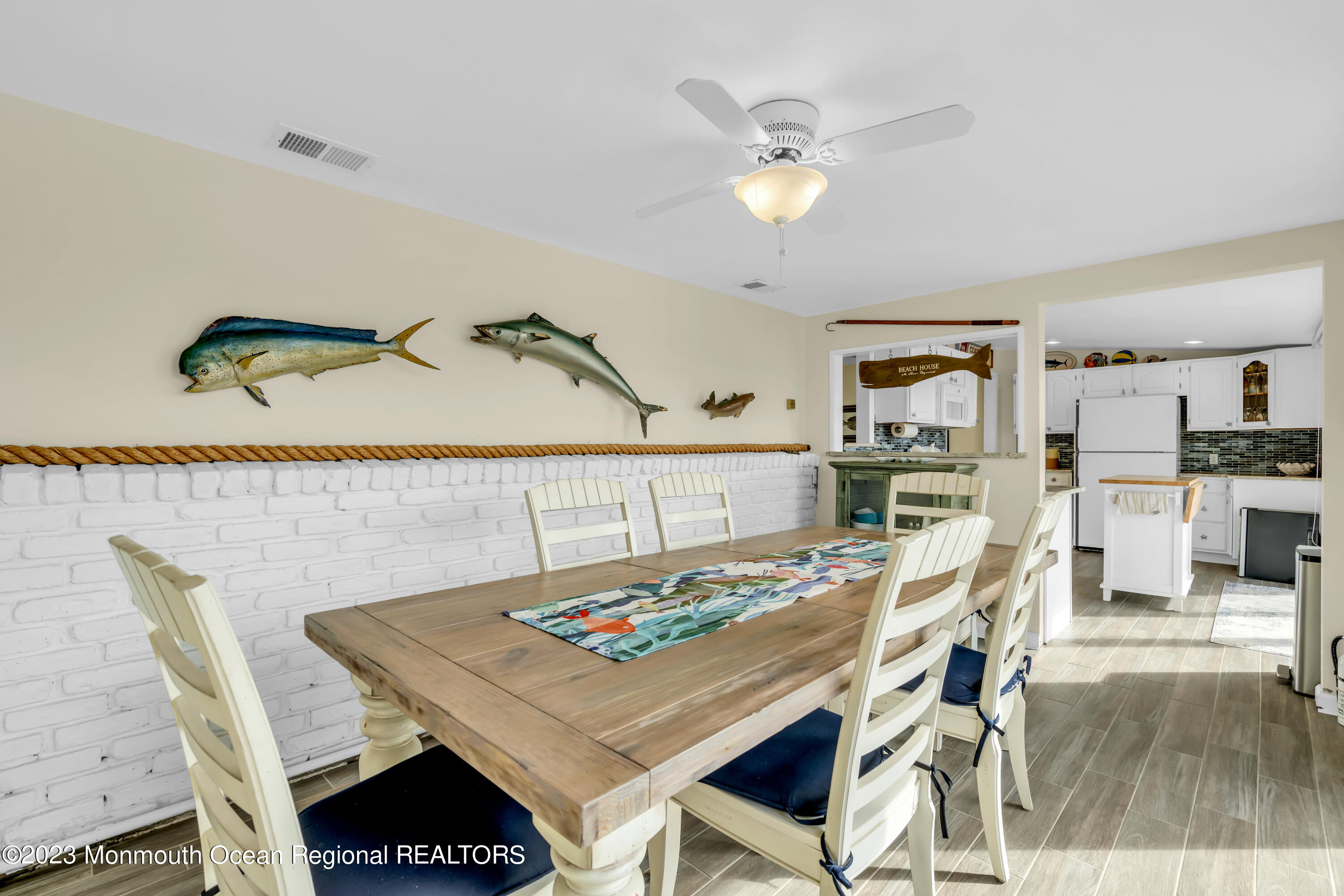 112 Newark Road Barnegat, NJ 08005 - Photo 21 of 44 a view of a dining room with furniture and wooden floor
