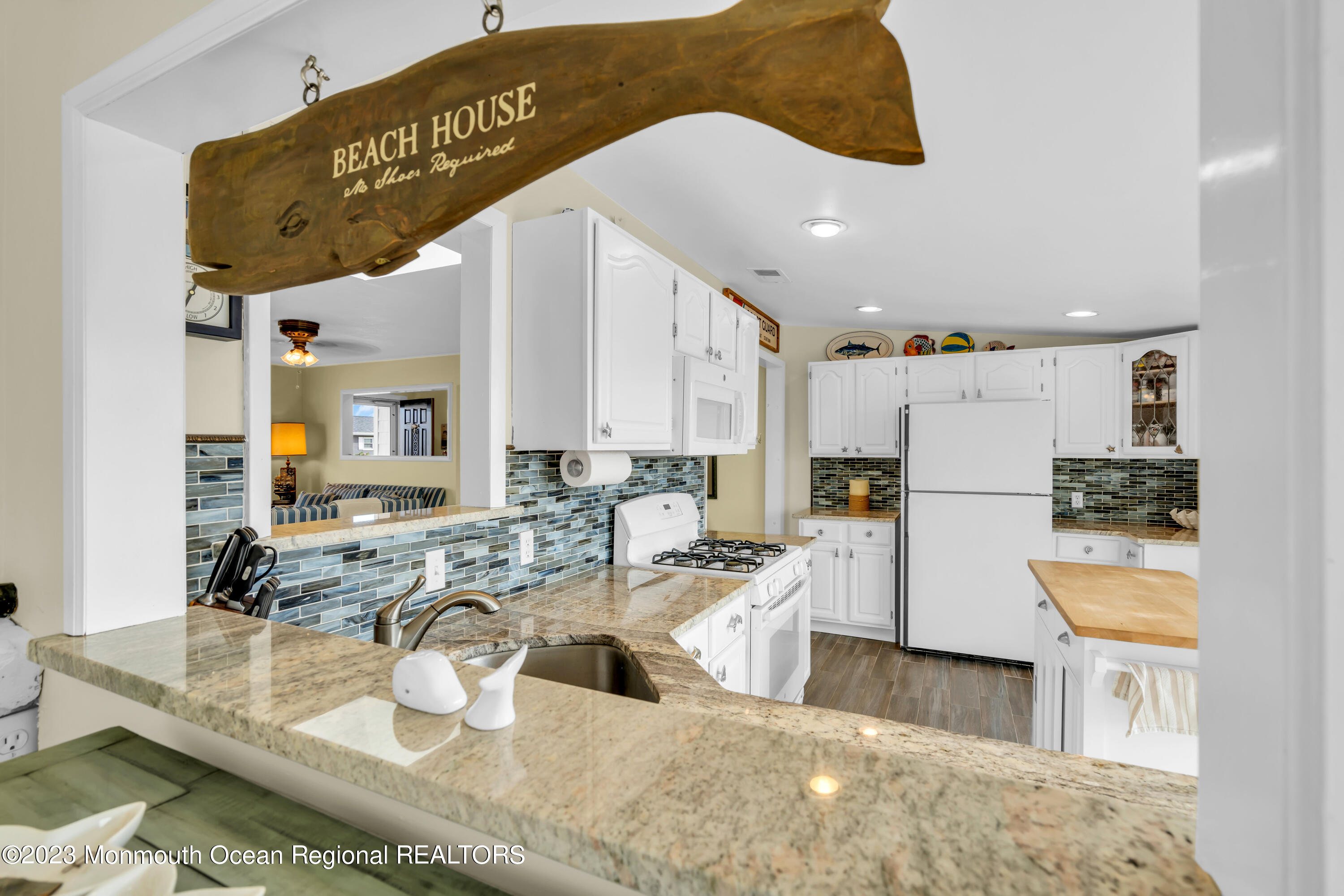 112 Newark Road Barnegat, NJ 08005 - Photo 24 of 44 a large white kitchen with a large window