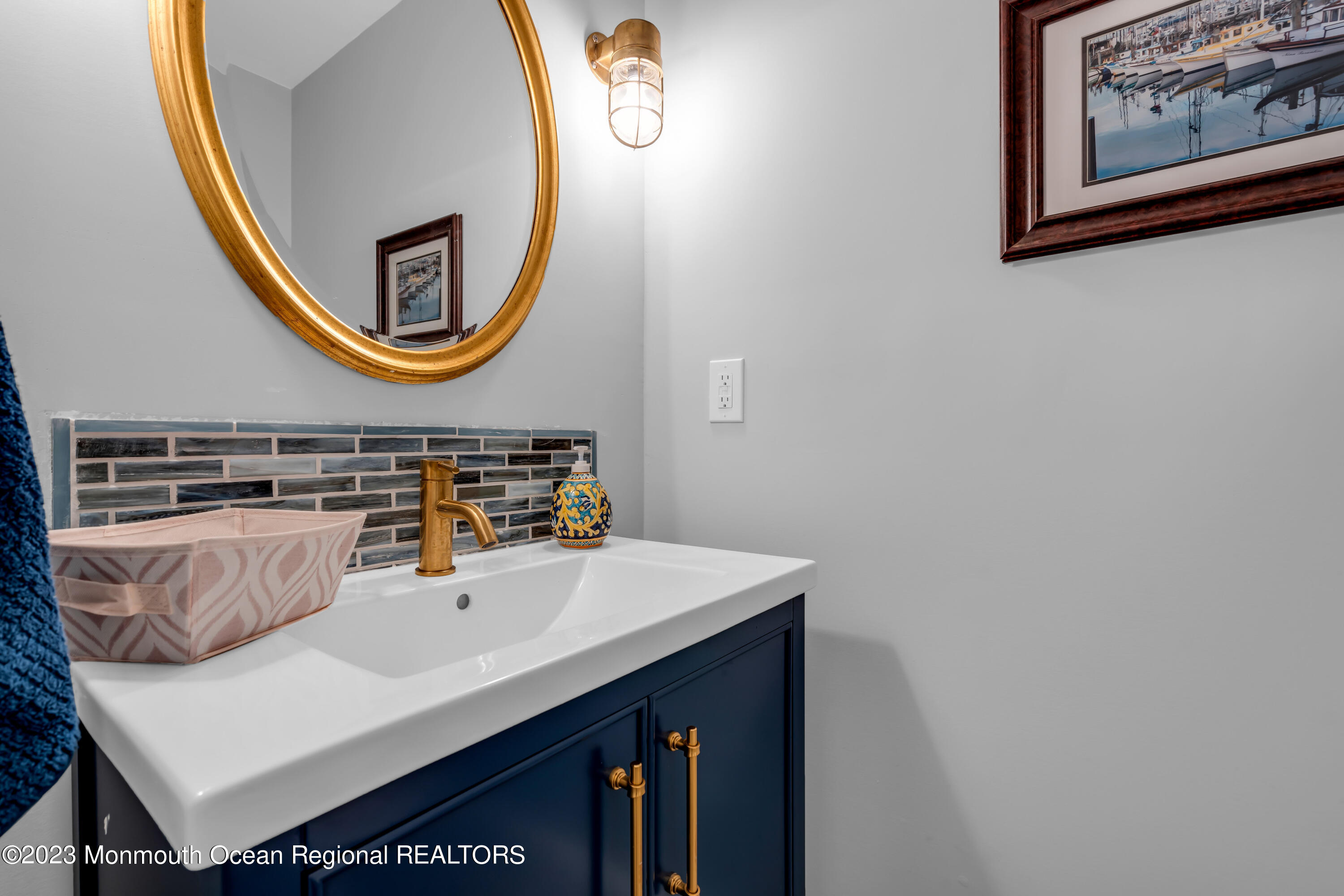 112 Newark Road Barnegat, NJ 08005 - Photo 30 of 44 a bathroom with a sink and a mirror