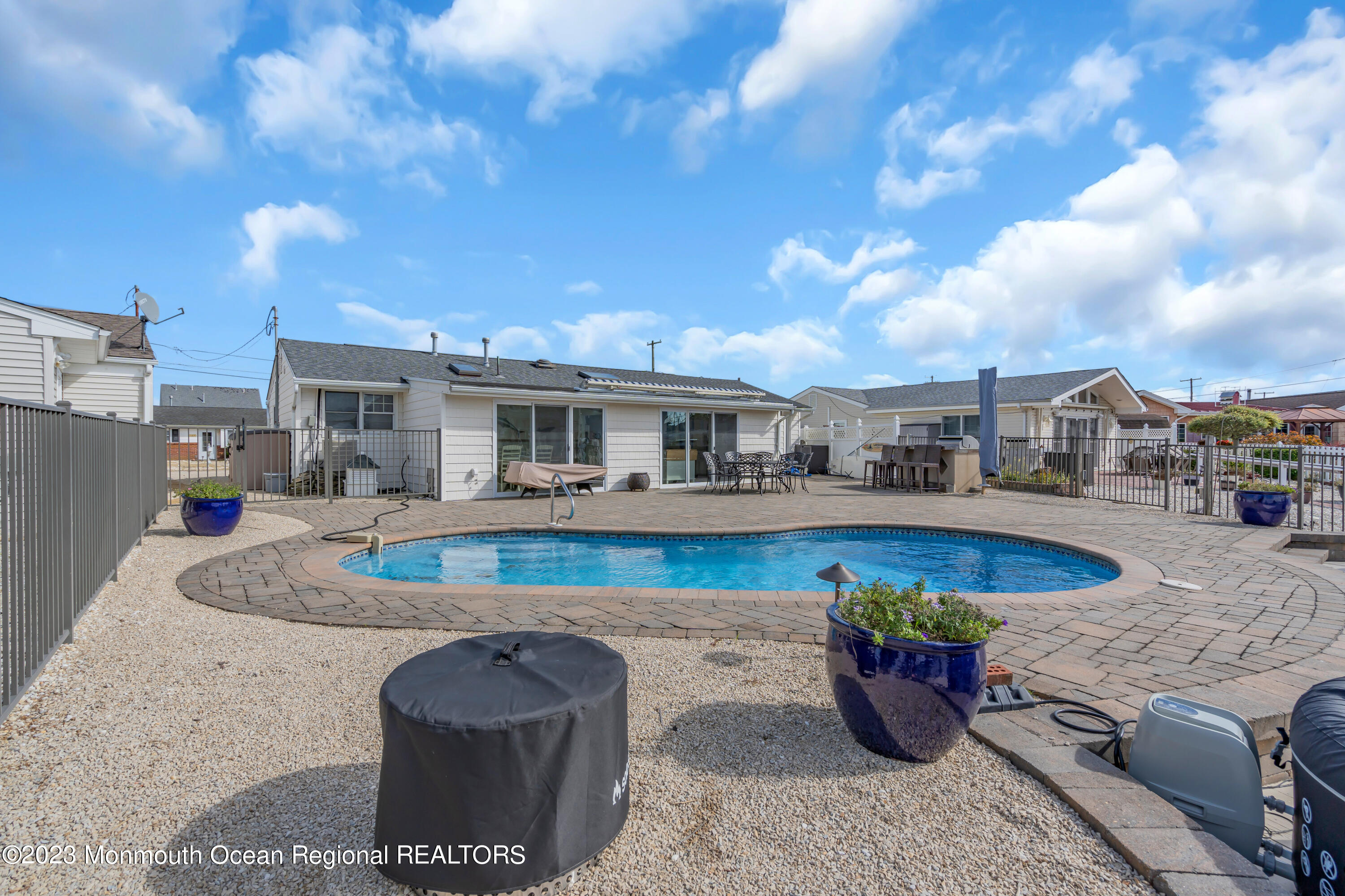 112 Newark Road Barnegat, NJ 08005 - Photo 35 of 44 a view of a swimming pool with a patio