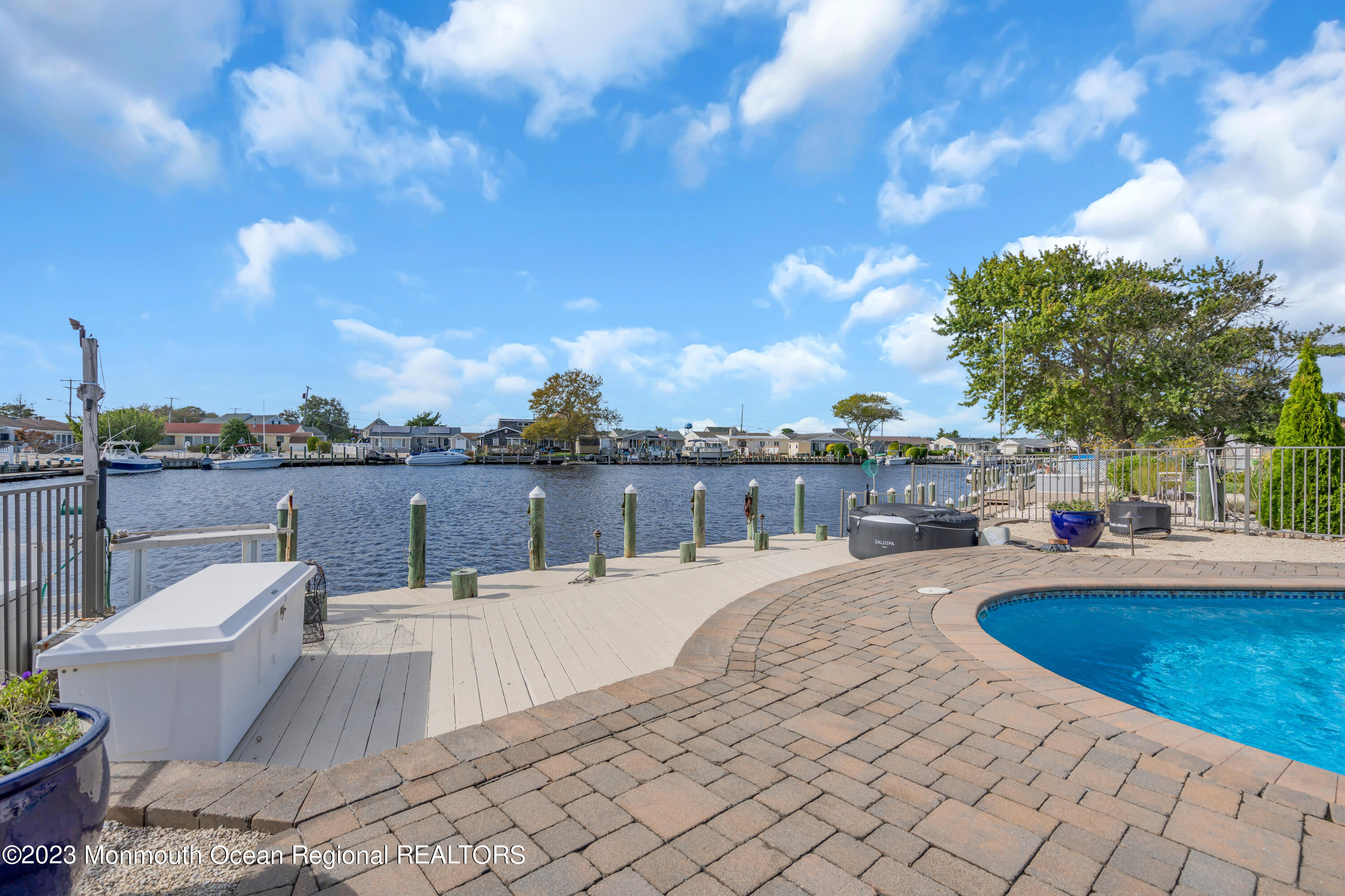 112 Newark Road Barnegat, NJ 08005 - Photo 37 of 44 a view of a roof deck with couches and sky view