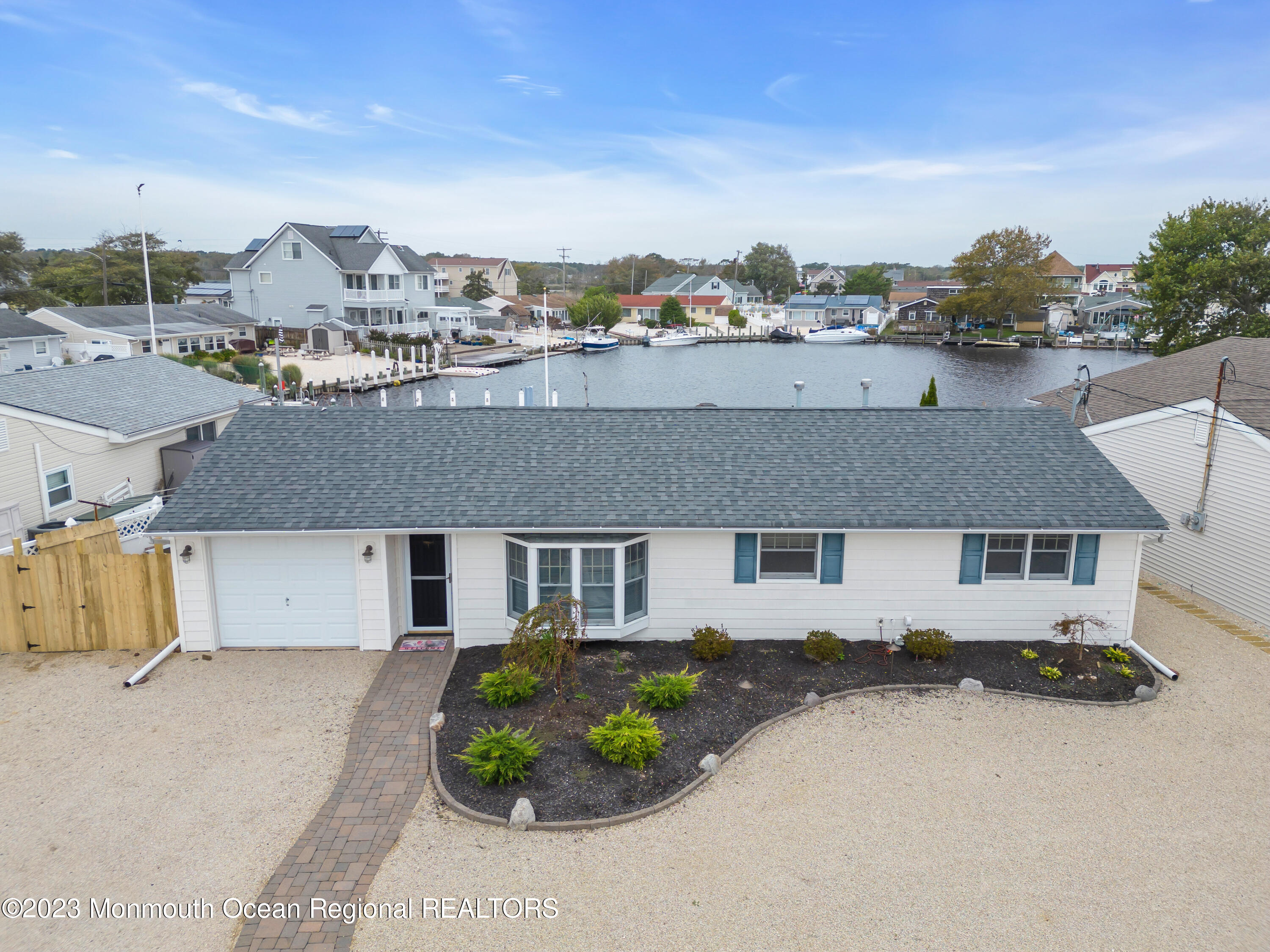 112 Newark Road Barnegat, NJ 08005 - Photo 42 of 44 a aerial view of a house with a yard and a large tree