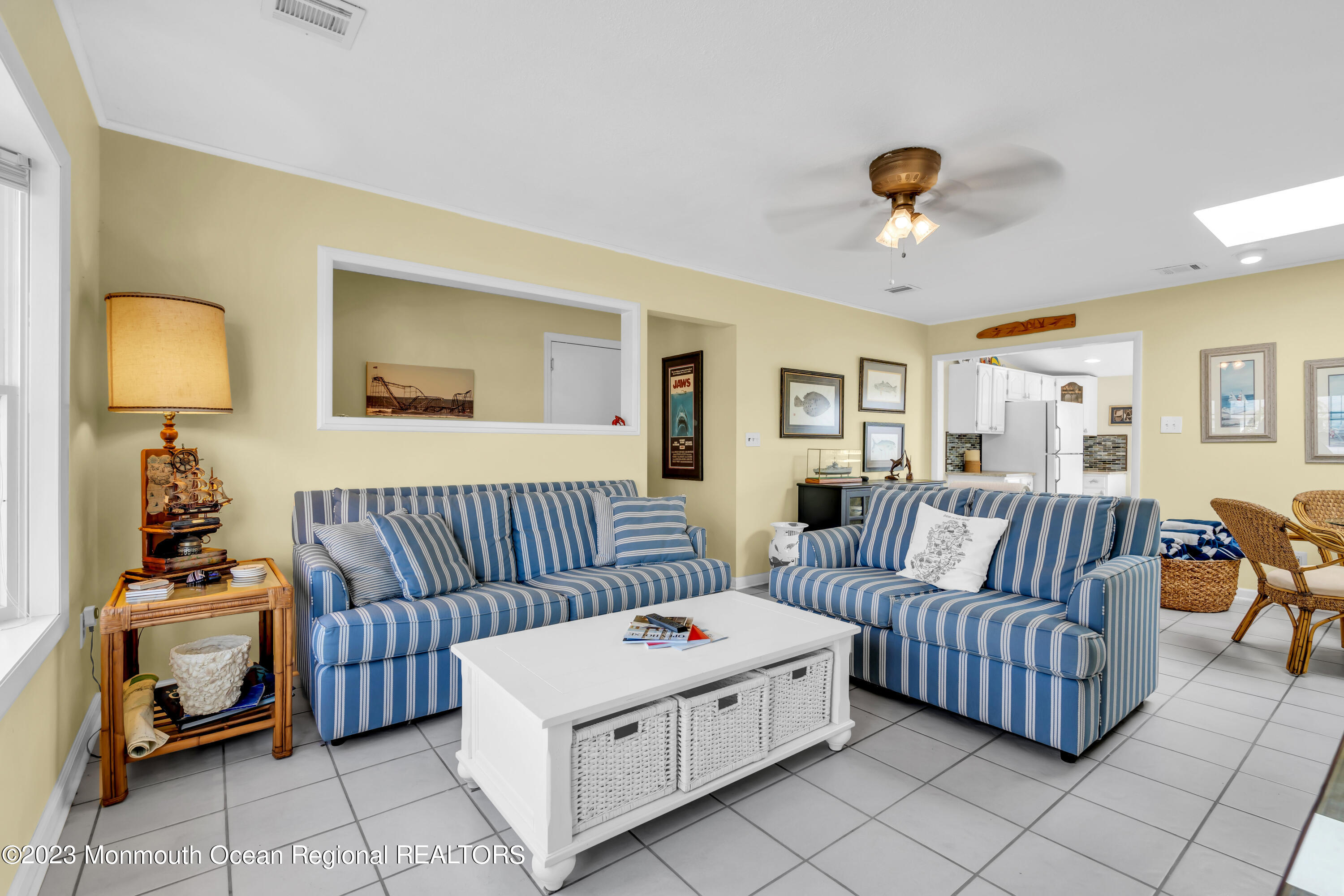 112 Newark Road Barnegat, NJ 08005 - Photo 10 of 44 a living room with furniture and a lamp