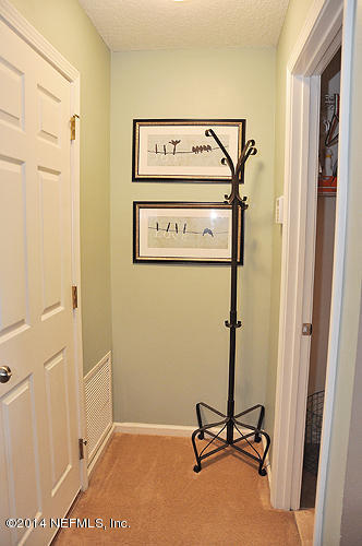 836 Crystal Spring Way St. Augustine, FL 32092 - Photo 10 of 36 Garage Entry and Laundry Room
