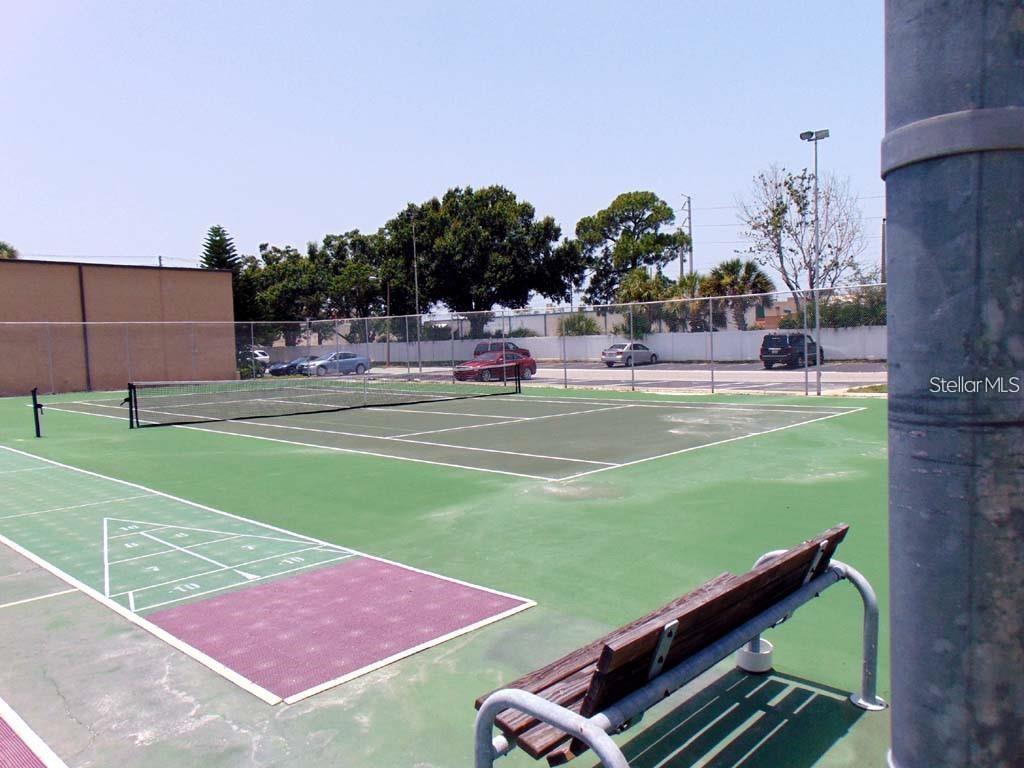 7701 Starkey Road, Unit 731 Seminole, FL 33777 - Photo 16 of 19 a view of a tennis court
