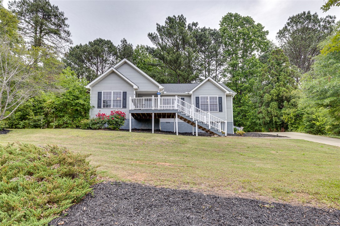 121 Crimson Leaf Lane Liberty, SC 29657 - Photo 1 of 30 This charming home features a lovely deck, ideal for enjoying the surrounding natural landscape and mature trees.