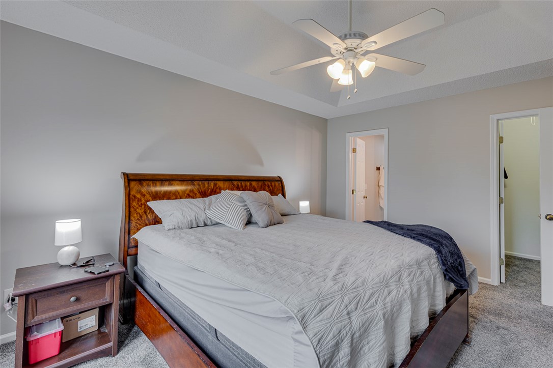 121 Crimson Leaf Lane Liberty, SC 29657 - Photo 11 of 30 This tranquil bedroom offers comfort and style with plush carpet and a ceiling fan for optimal airflow.