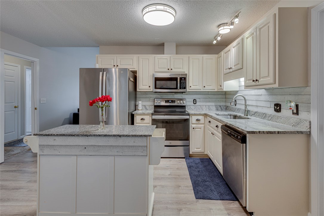 121 Crimson Leaf Lane Liberty, SC 29657 - Photo 17 of 30 This bright kitchen features modern appliances and ample counter space for culinary endeavors.