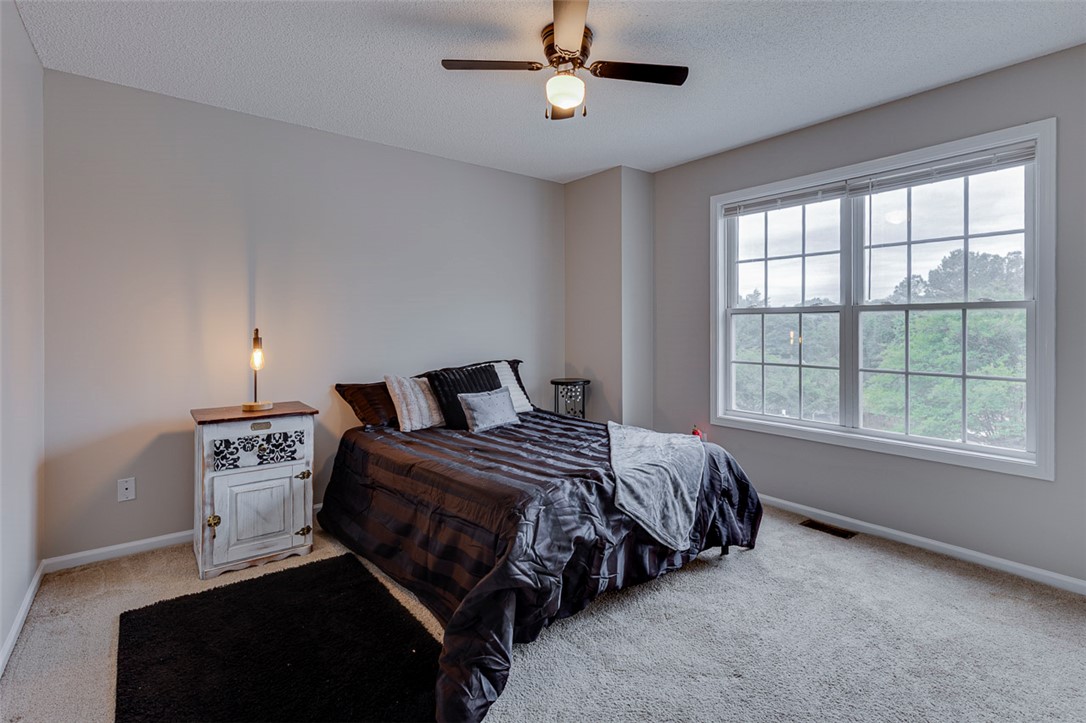 121 Crimson Leaf Lane Liberty, SC 29657 - Photo 23 of 30 This cozy bedroom offers a tranquil retreat with ample natural light.