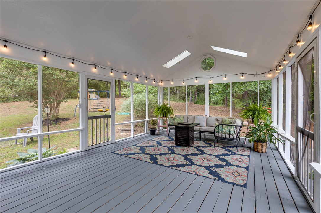 121 Crimson Leaf Lane Liberty, SC 29657 - Photo 25 of 30 This airy screened porch offers serene views and an inviting outdoor living space.