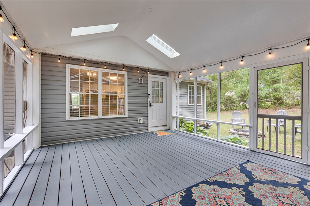 121 Crimson Leaf Lane Liberty, SC 29657 - Photo 27 of 30 This inviting screened porch offers serene backyard views and abundant natural light.