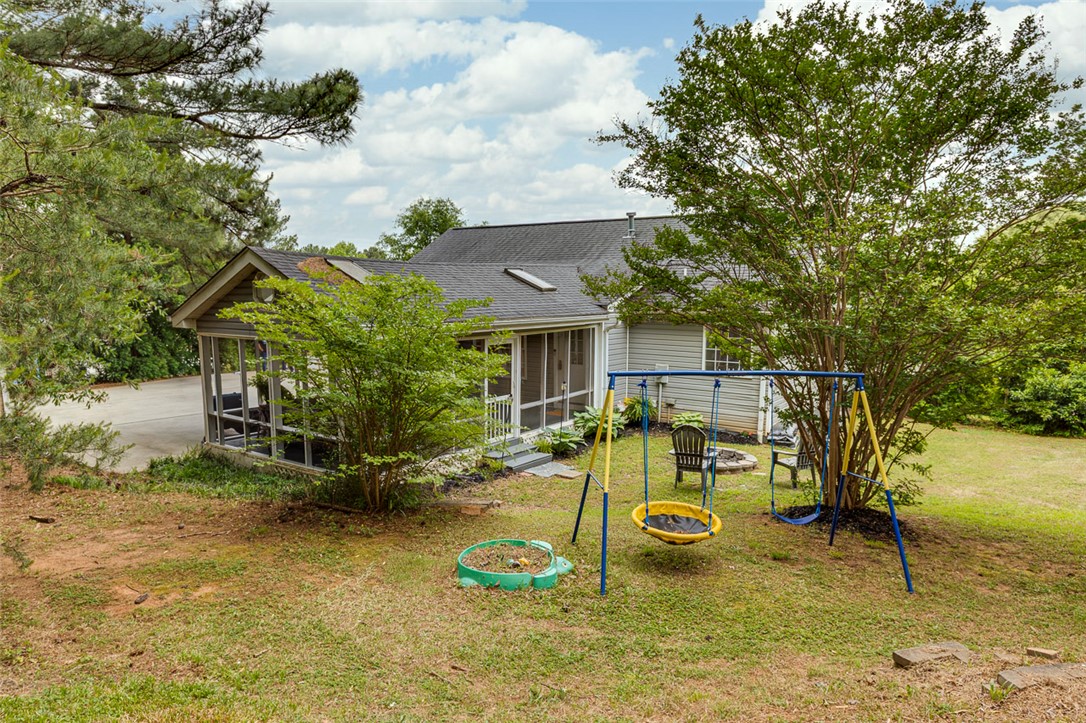 121 Crimson Leaf Lane Liberty, SC 29657 - Photo 29 of 30 This residence features a comfortable screened porch and a spacious yard, ideal for outdoor enjoyment.