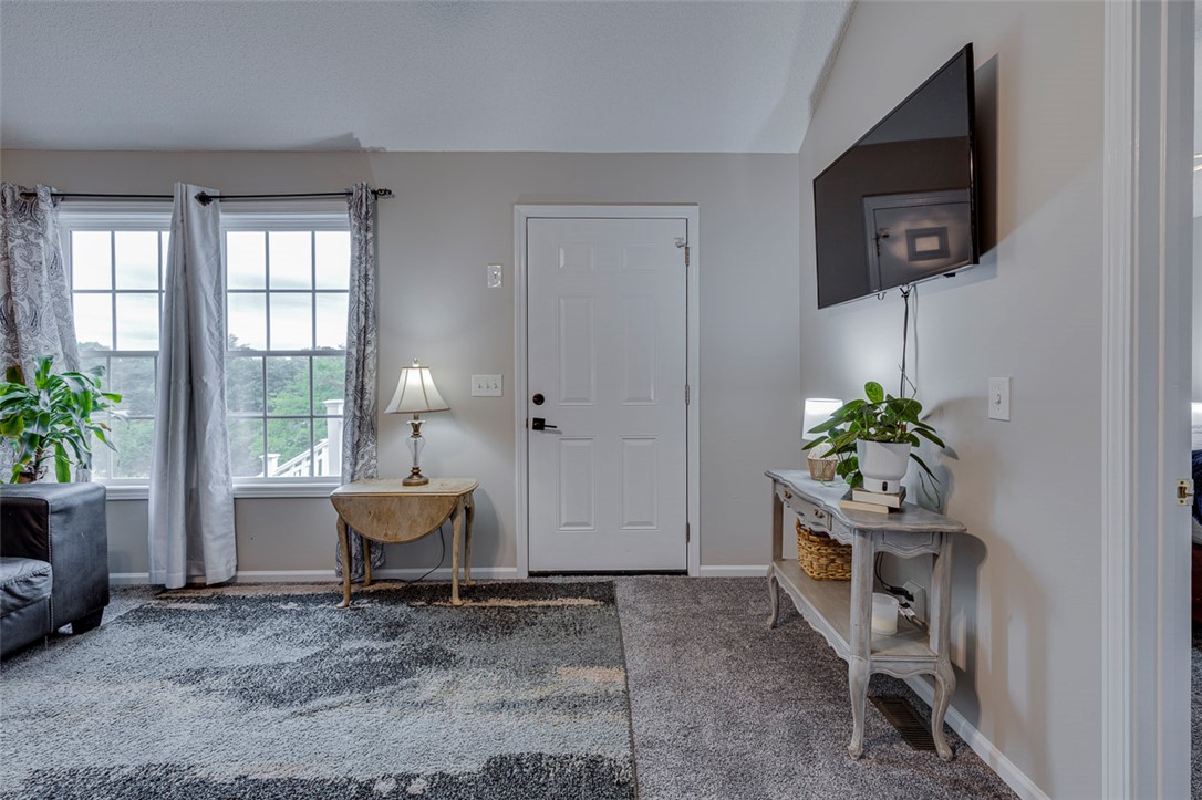 121 Crimson Leaf Lane Liberty, SC 29657 - Photo 5 of 30 This inviting entryway seamlessly connects to bright windows and a spacious living area.