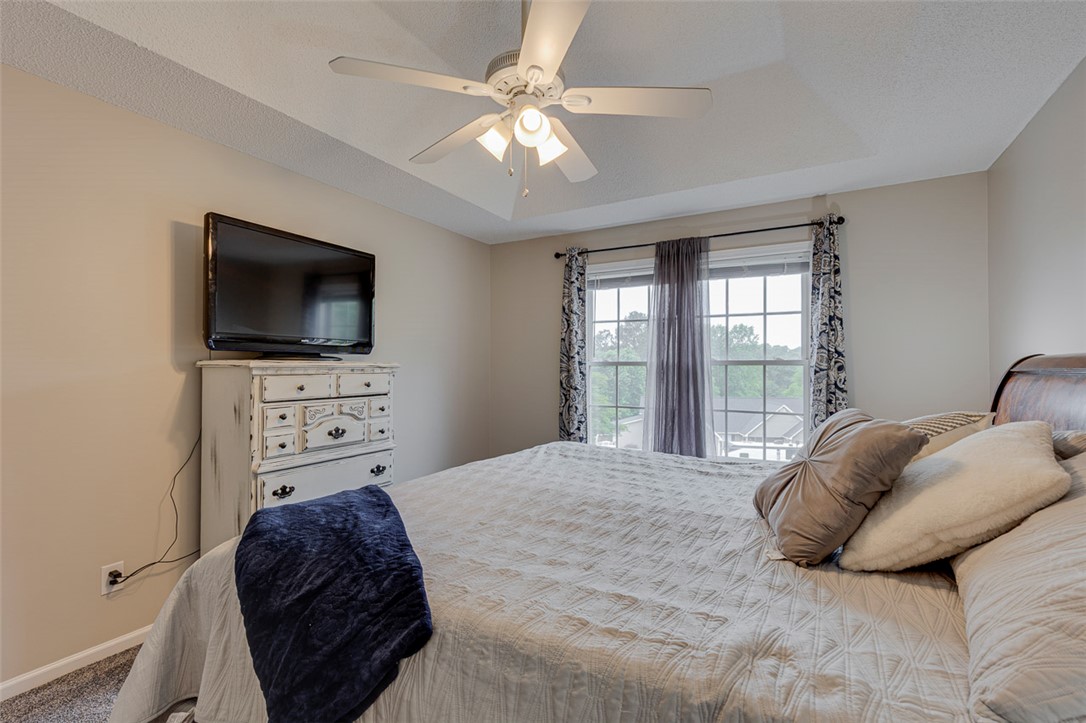 121 Crimson Leaf Lane Liberty, SC 29657 - Photo 10 of 30 This cozy bedroom offers a tranquil retreat with ample natural light.