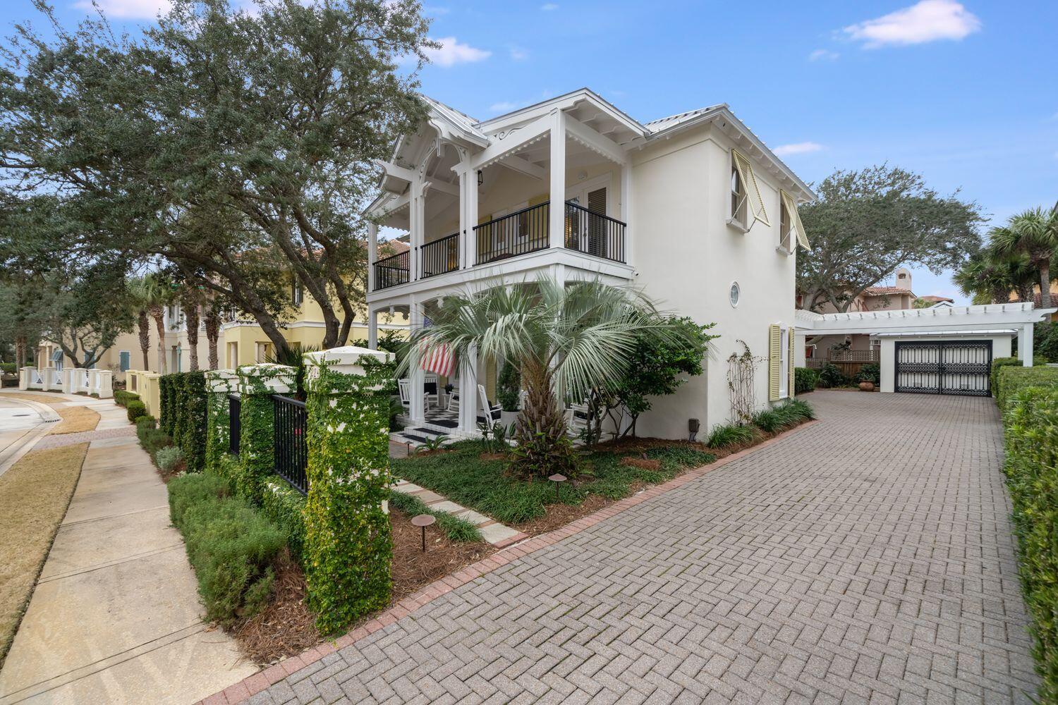 224 Rue Caribe Miramar Beach, FL 32550 - Photo 11 of 67 a front view of a house with garden