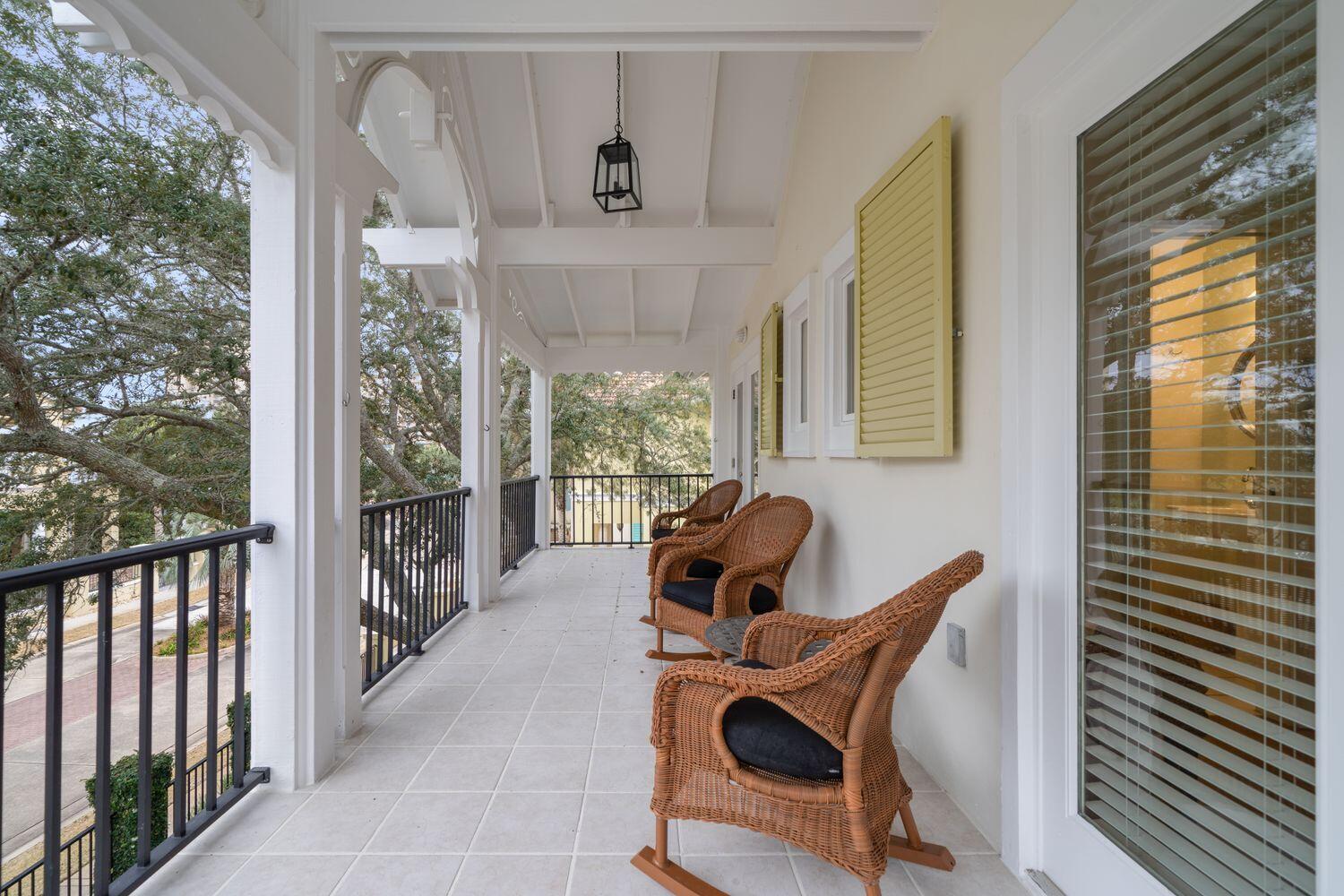 224 Rue Caribe Miramar Beach, FL 32550 - Photo 12 of 67 a living room filled with furniture and a floor to ceiling window