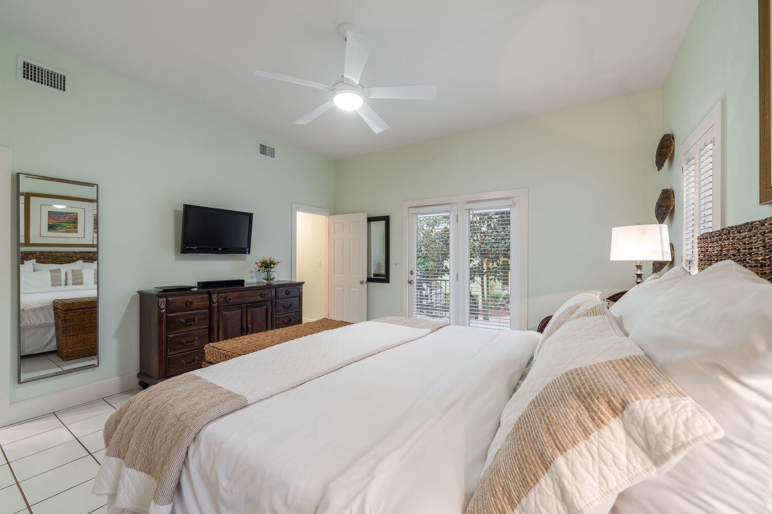 224 Rue Caribe Miramar Beach, FL 32550 - Photo 27 of 67 a bedroom with a bed and a flat screen tv