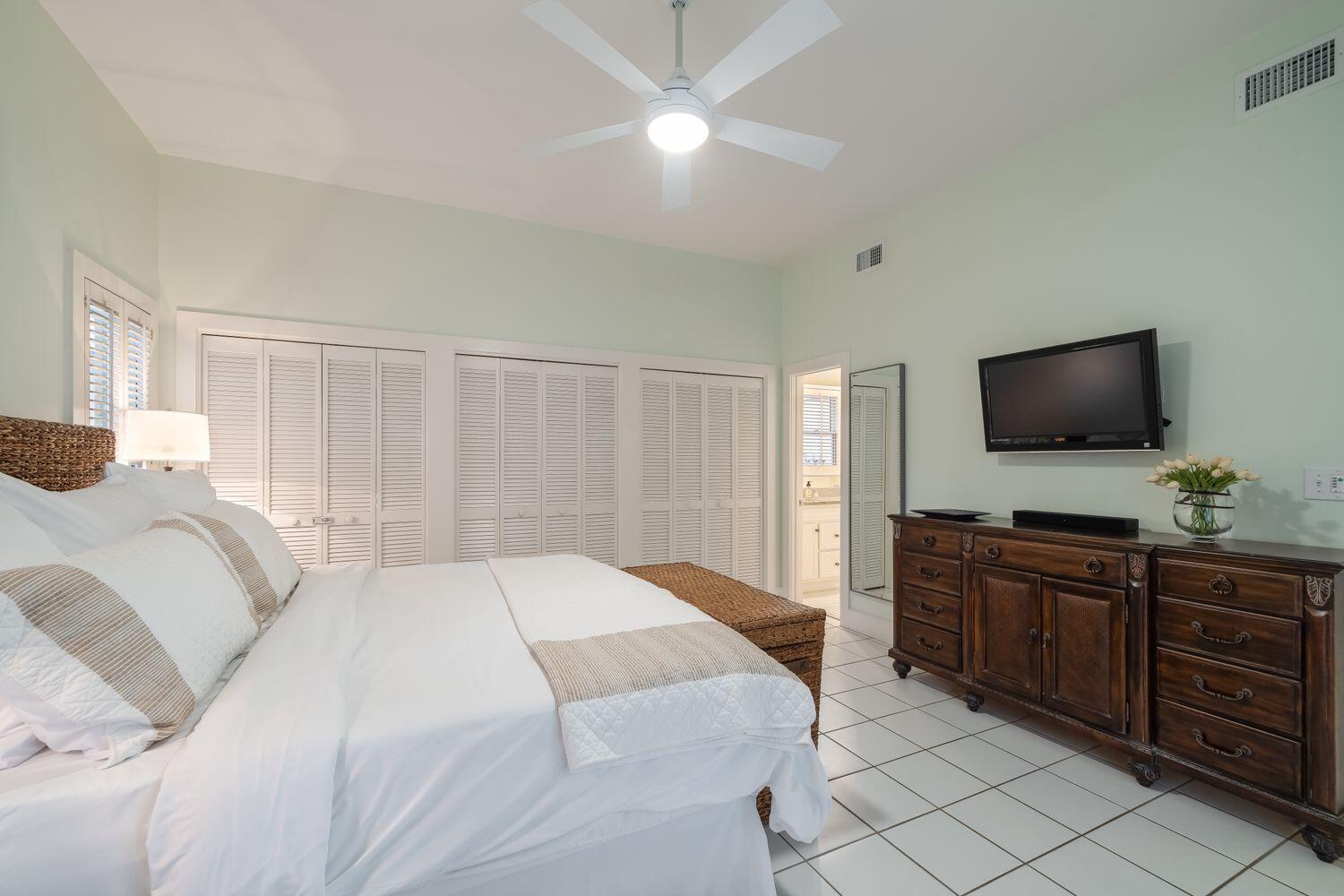 224 Rue Caribe Miramar Beach, FL 32550 - Photo 28 of 67 a bedroom with a bed and a flat screen tv