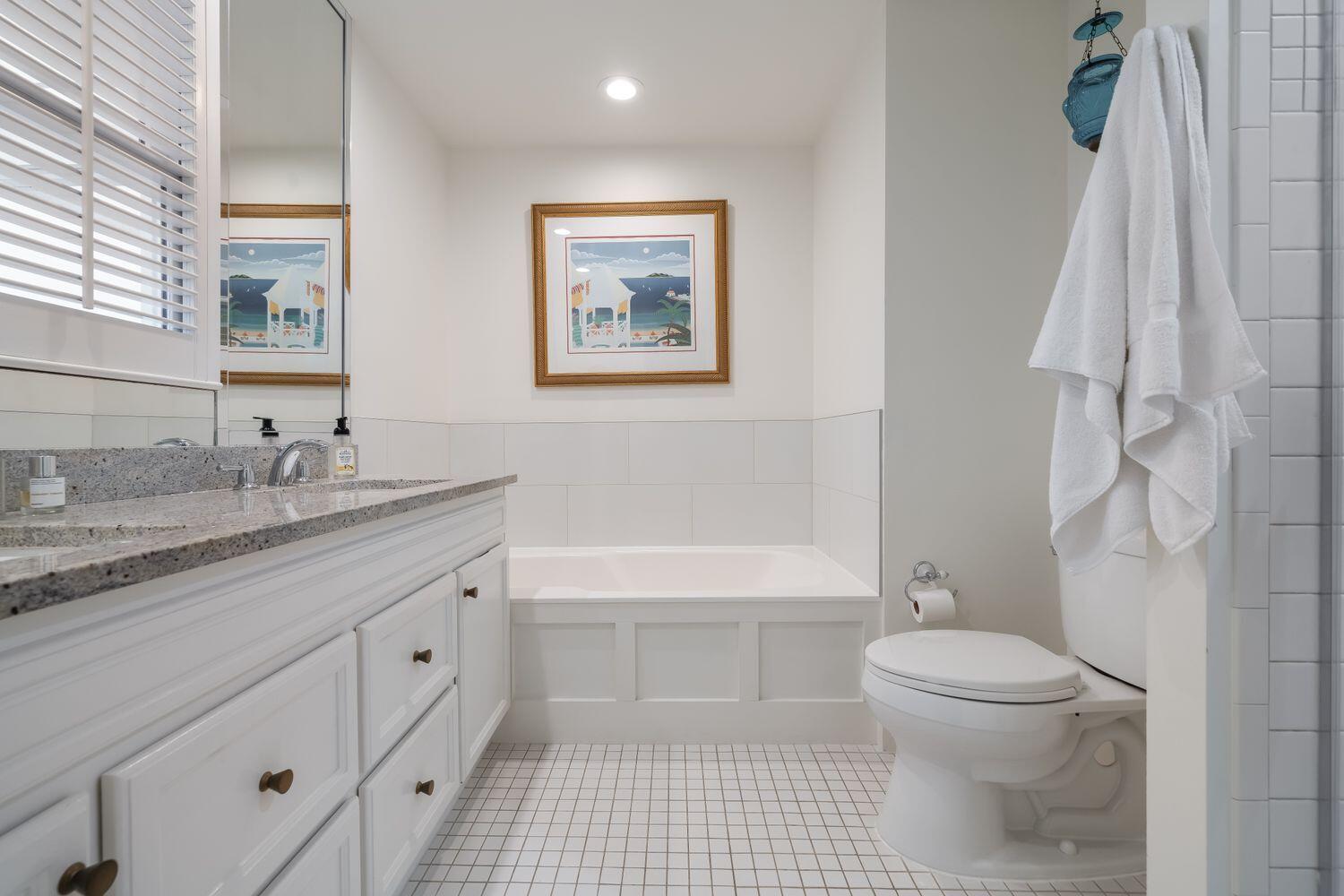 224 Rue Caribe Miramar Beach, FL 32550 - Photo 30 of 67 a bathroom with a granite countertop sink toilet and shower