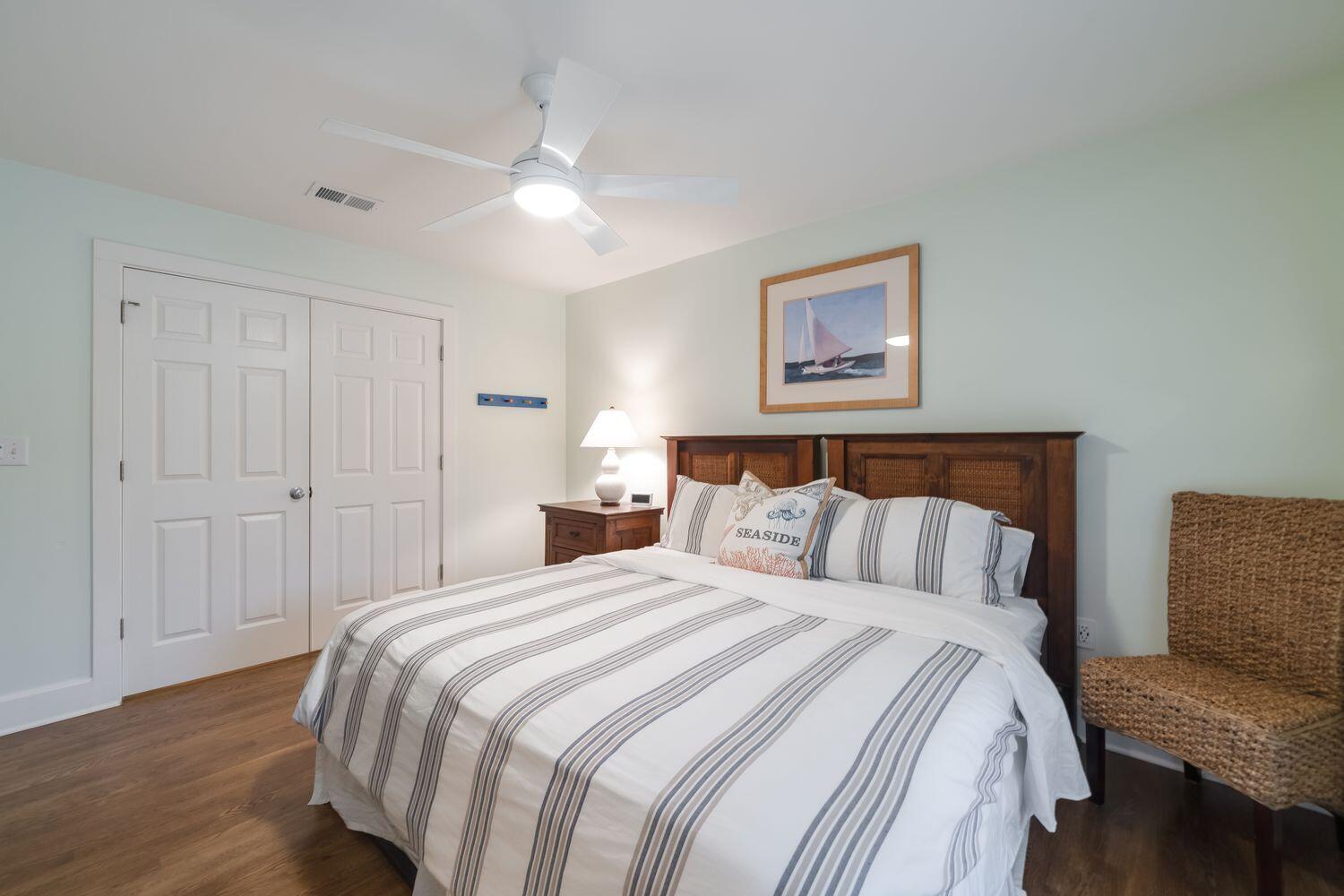 224 Rue Caribe Miramar Beach, FL 32550 - Photo 35 of 67 a bedroom with a bed and wooden floor