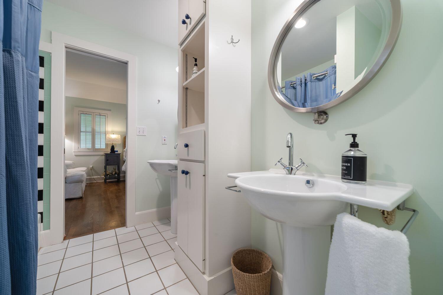 224 Rue Caribe Miramar Beach, FL 32550 - Photo 37 of 67 a spacious bathroom with a sink a toilet and a mirror