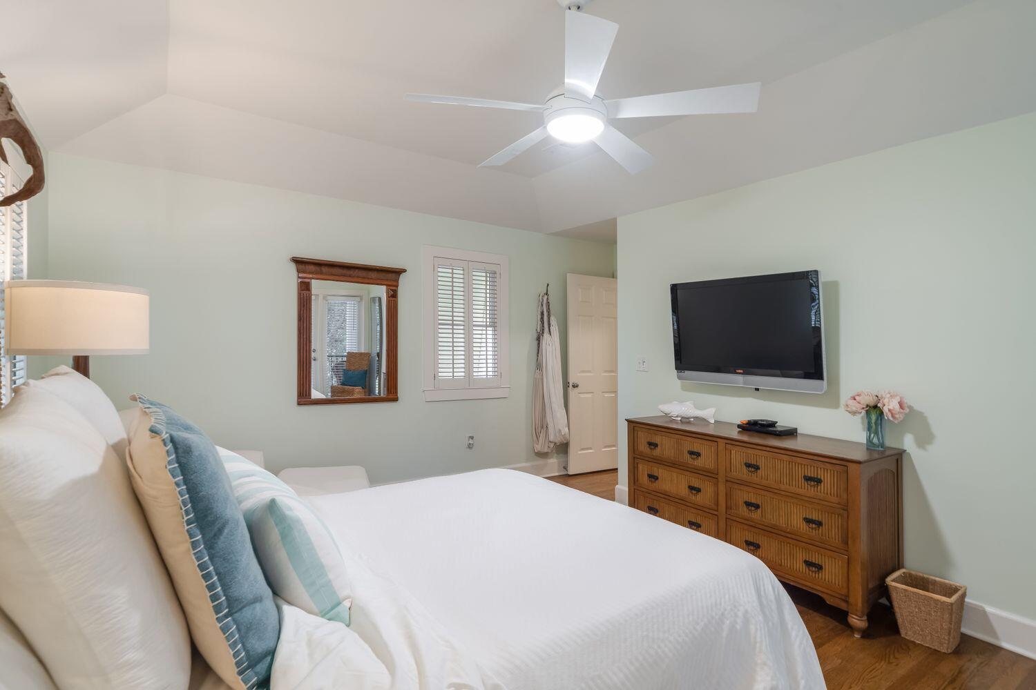224 Rue Caribe Miramar Beach, FL 32550 - Photo 41 of 67 a bedroom with a bed and a flat screen tv
