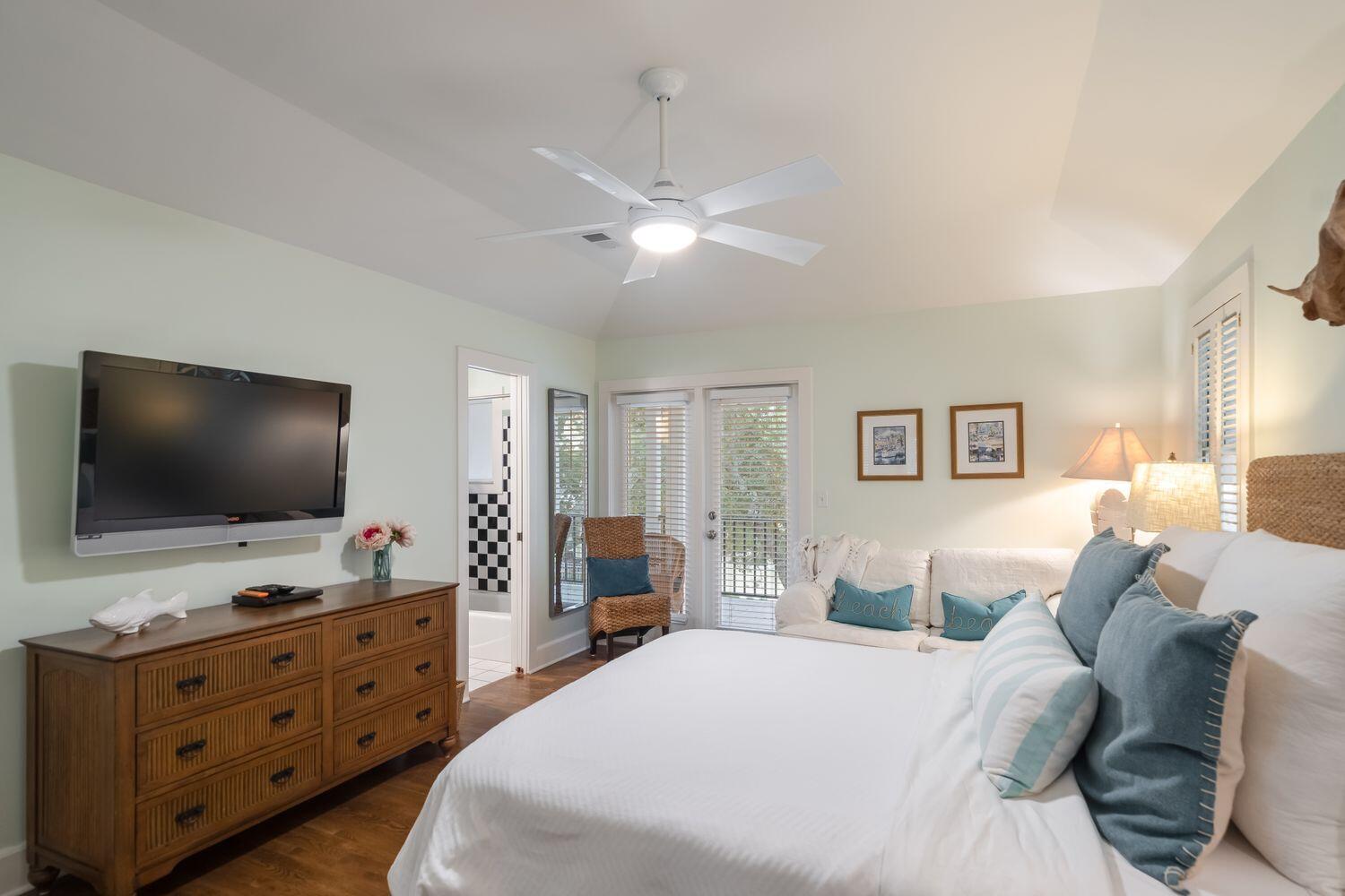 224 Rue Caribe Miramar Beach, FL 32550 - Photo 42 of 67 a bedroom with a bed and a flat screen tv