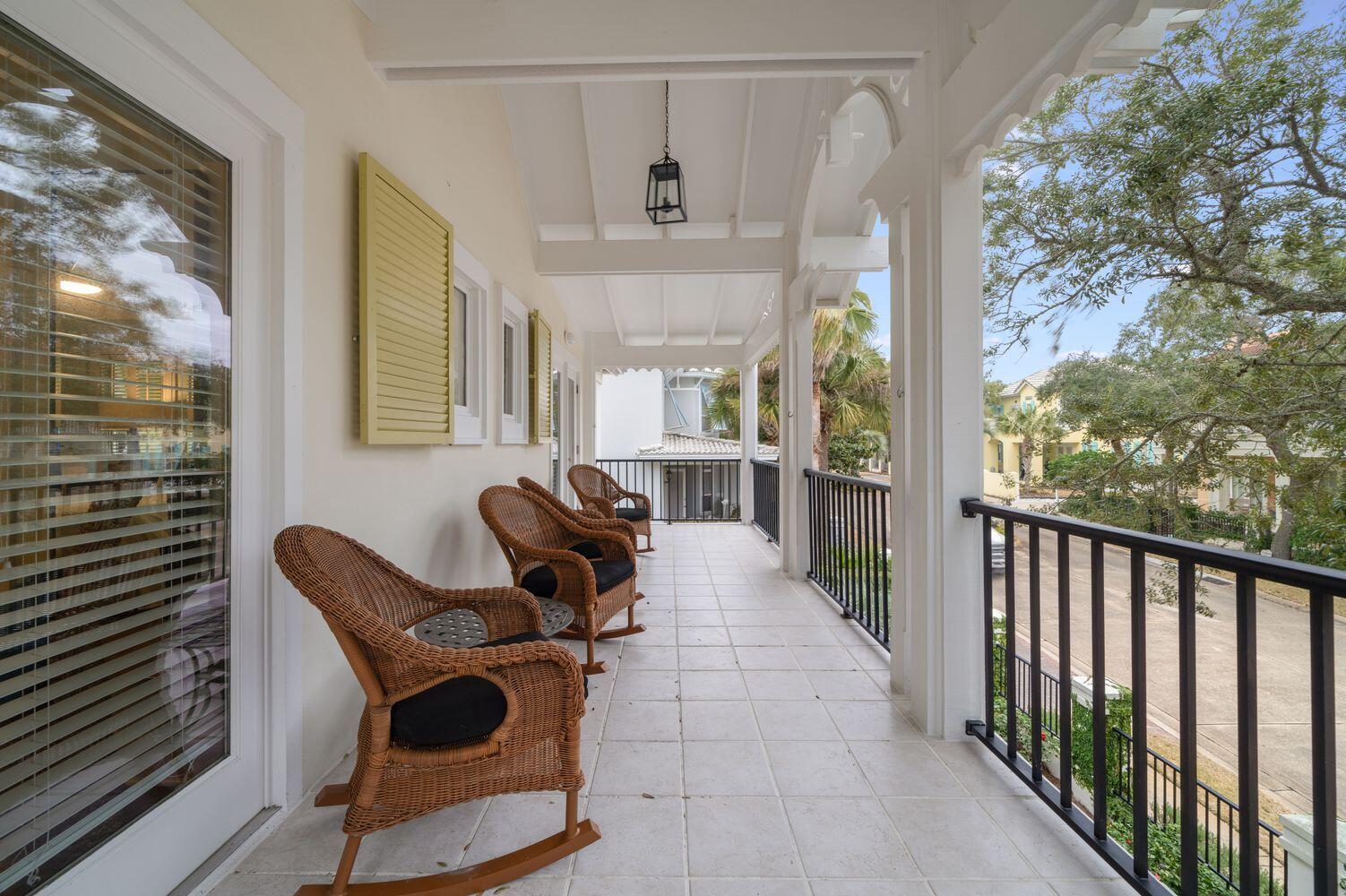 224 Rue Caribe Miramar Beach, FL 32550 - Photo 10 of 67 a living room with furniture and a floor to ceiling window
