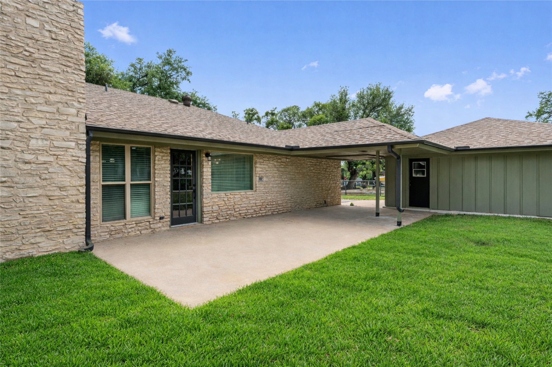 224 Clear Spring Road Georgetown, TX 78628 - Photo 33 of 40 a front view of a house with a garden and yard