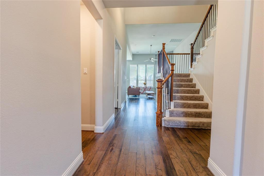 3920 Bentgrass Road Plano, TX 75023 - Photo 5 of 30 a view of entryway and hall with wooden floor