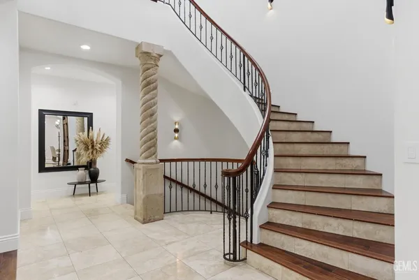 a view of swimming pool with chairs