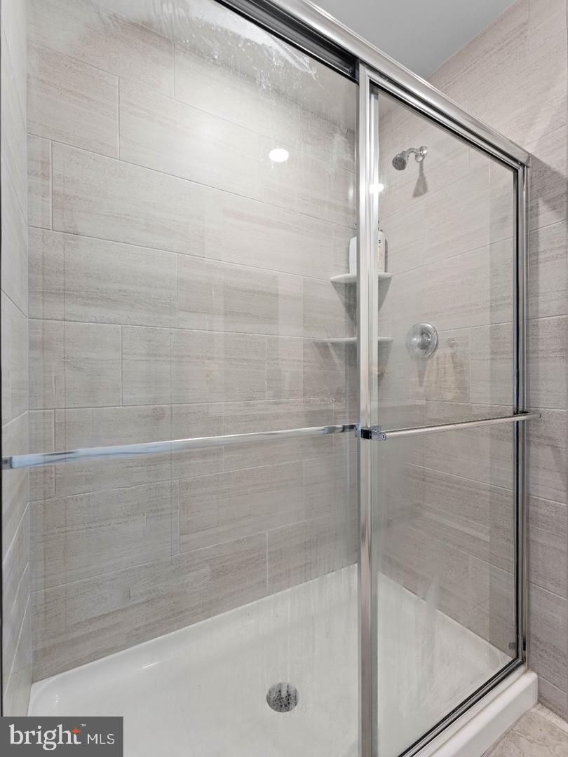 12 Handbell Lane Sicklerville, NJ 08081 - Photo 16 of 30 a bathroom with a shower and a bath tub