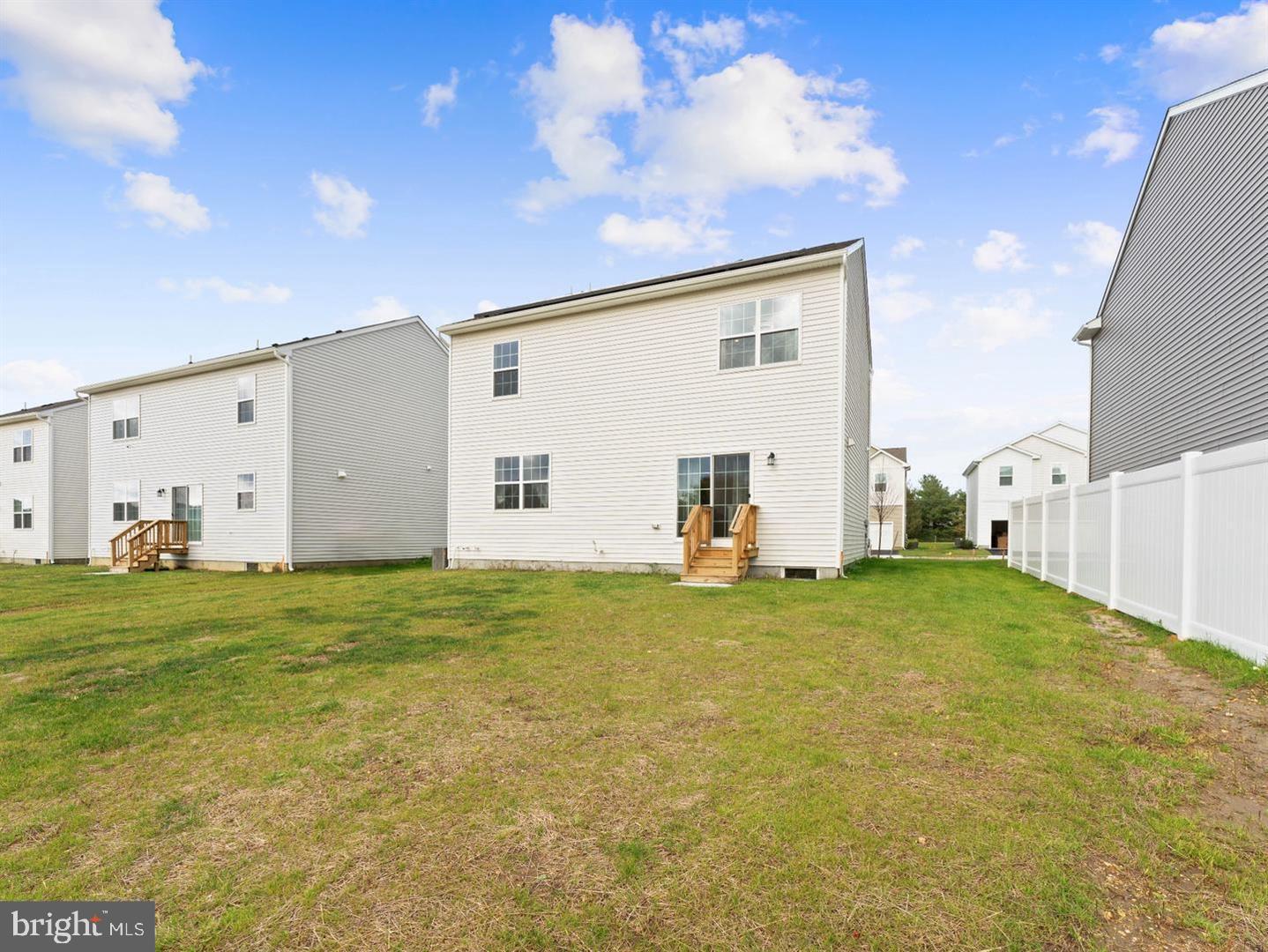 12 Handbell Lane Sicklerville, NJ 08081 - Photo 29 of 30 a view of a big yard with an empty space